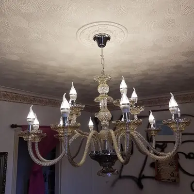 Crystal chandelier installation, one of our electrical projects in Leicestershire