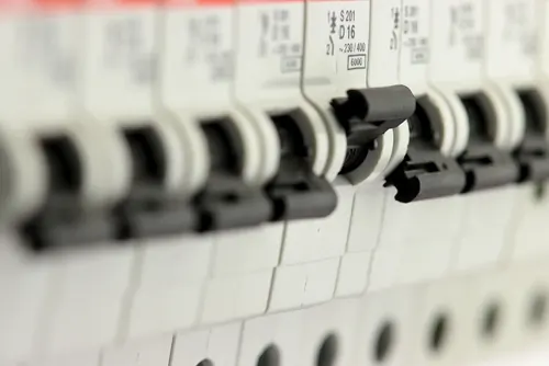Row of circuit breakers inside a consumer unit fitted as part of consumer unit upgrades in Leicestershire