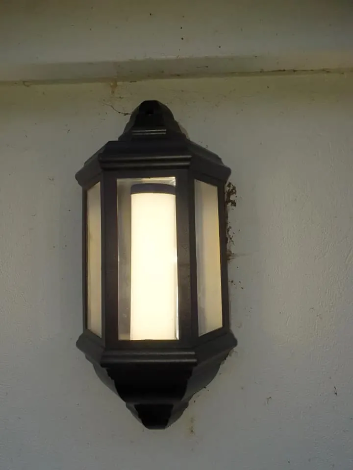 Traditional exterior wall lantern for a Rutland stone cottage